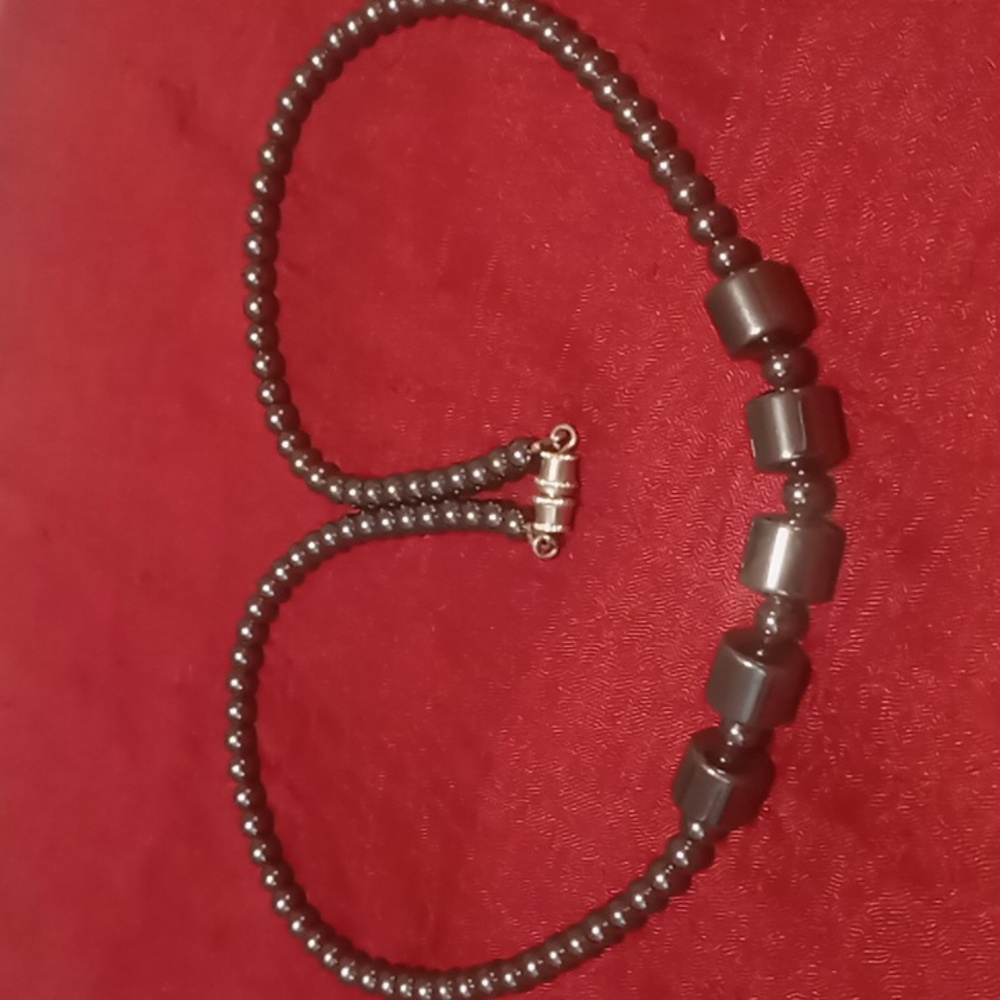 Vintage magnetite necklace 18 inches long.